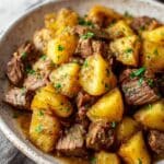 Slow Cooker Steak and Cheddar Potato Casserole